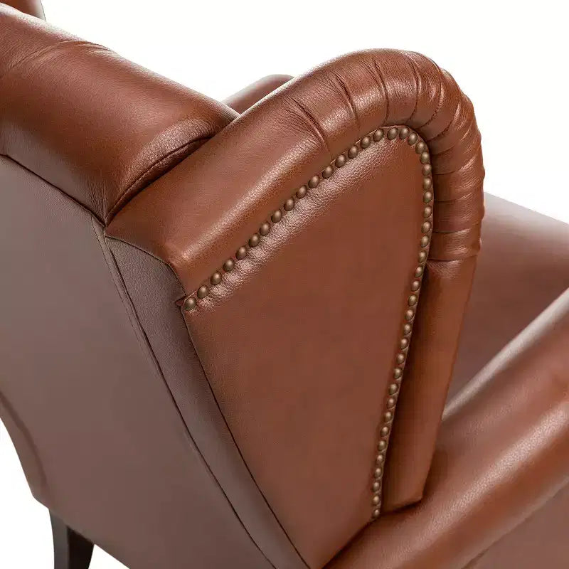 Poltrona Wingback monoposto in vera pelle nera / marrone / bordeaux / cammello / blu navy, con borchie decorative