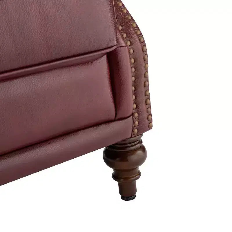 Poltrona Wingback monoposto in vera pelle nera / marrone / bordeaux / cammello / blu navy, con borchie decorative