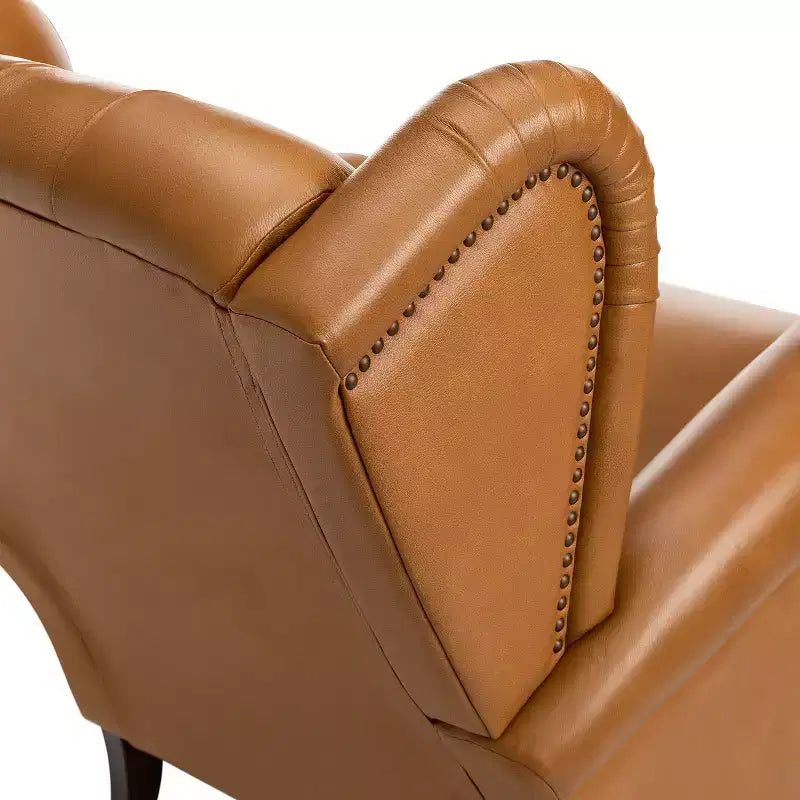 Poltrona Wingback monoposto in vera pelle nera / marrone / bordeaux / cammello / blu navy, con borchie decorative
